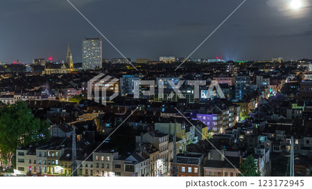 Aerial night timelapse panorama over Brussels skyline in Schaerbeek with Saint-Servais Church Aerial night timelapse panorama over Brussels skyline in Schaerbeek with Saint-Servais Church 123172945