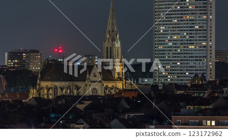 Aerial timelapse of Saint Servatius Church at night in Schaerbeek, Brussels, Belgium. 123172962