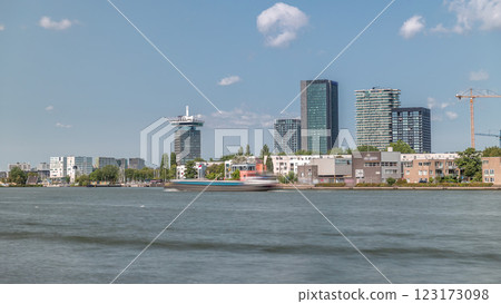 Timelapse of the most fashionable modern towers in Amsterdam, located in the city center on the Hey embankment. Netherlands Timelapse of the most fashionable modern towers in Amsterdam, located in the city center on the Hey embankment. Netherlands 123173098