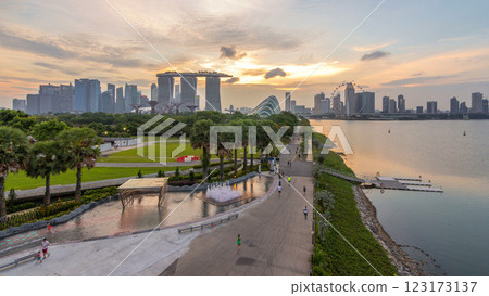 Singapore skyline panorama near Gardens by the bay with cloud forest, flower dome and supertrees day to night timelapse after sunset 123173137