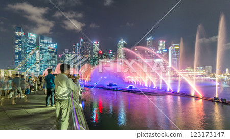 Light and Water Show along promenade in front of Marina Bay Sands timelapse 123173147