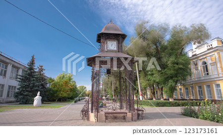 Beautiful park with clock on pavilion in the center of Uralsk timelapse hyperlapse. Western Kazakhstan. 123173161