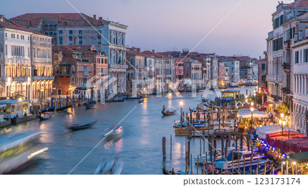 Grand Canal in Venice, Italy day to night timelapse. Gondolas and city lights from Rialto Bridge. 123173174