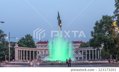 The heroes monument of the red army in schwarzenbergplatz day to night timelapse at night with colorful light fountain in vienna, austria 123173201
