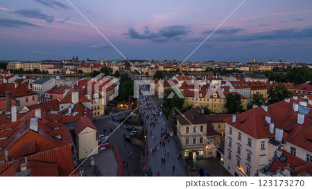 Aerial view of the Old Town architecture and Charles Bridge over Vltava river day to night timelapse in Praha 123173270