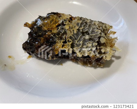 Buckwheat honey in golden honeycombs 123173421