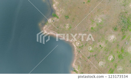 Drone shot. Aerial view scenic landscape of a large river delta amid a lush forest at the tropical Asia place 123173534