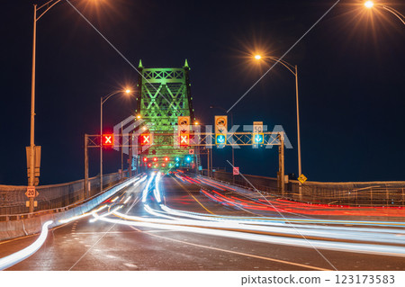 Jacques Cartier Bridge (Pont Jacques-Cartier) illuminated at night. Traffic on the bridge with the car light trails. Montreal, Quebec, Canada. Jacques Cartier Bridge (Pont Jacques-Cartier) illuminated at night. Traffic on the bridge with the car light trails. Montreal, Quebec, Canada. 123173583