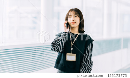 Smiling woman/businesswoman talking on smartphone Smiling woman/businesswoman talking on smartphone 123173773