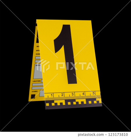 Marker of Crime Scene, Number 1 on a black background Marker of Crime Scene, Number 1 on a black background 123173810