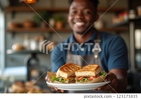 Artisanal Delicatessen A Moment of Culinary Service and Hospitality in a Contemporary Urban Cafe 123173835