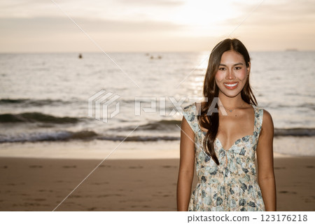 Portrait of young woman on the beach Portrait of young woman on the beach 123176218