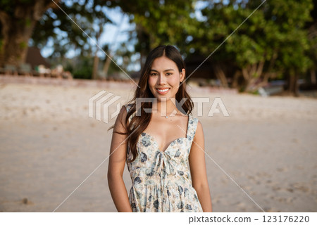 Portrait of young woman on the beach Portrait of young woman on the beach 123176220