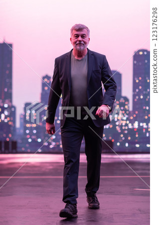 Confident Gentleman Walking in an Urban Evening Cityscape. Confident Gentleman Walking in an Urban Evening Cityscape. 123176298