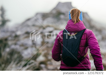 Trail Runner in Misty Mountain Landscape Trail Runner in Misty Mountain Landscape 123176372
