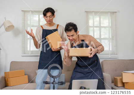 Online sellers showcasing their products while preparing for a live session at home. 123176535