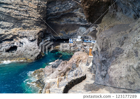 Iconic fishing village of Poris de Candelaria with cliff houses on the west coast of La Palma 123177289
