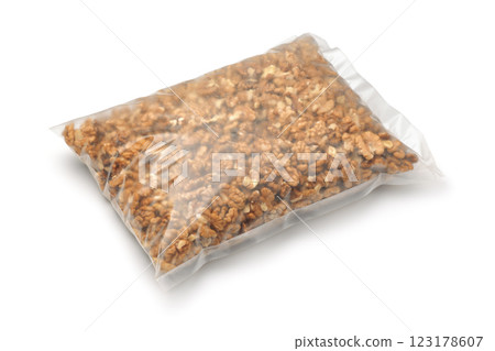 Peeled walnut kernels in transparent plastic bag 123178607