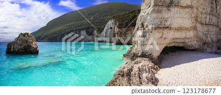 Greece best beaches of Ionian islands. Cephalonia (Kefalonia)- beautiful deserted beach Fteris with tropical turquoise sea, scenic rocks and white sand Greece best beaches of Ionian islands. Cephalonia (Kefalonia)- beautiful deserted beach Fteris with tropical turquoise sea, scenic rocks and white sand 123178677