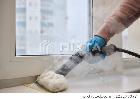 Using a Steam Roller to Clean Windows Effectively for a Beautiful and Sparkling Shine Using a Steam Roller to Clean Windows Effectively for a Beautiful and Sparkling Shine 123179058