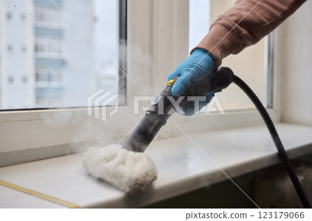 Using a Steam Roller to Clean Windows Effectively for a Beautiful and Sparkling Shine Using a Steam Roller to Clean Windows Effectively for a Beautiful and Sparkling Shine 123179066
