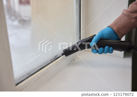 Efficient Steam Cleaning of Windows Utilizing Specialized Professional Equipment and Tools 123179072