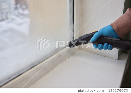 Efficient Steam Cleaning of Windows Utilizing Specialized Professional Equipment and Tools Efficient Steam Cleaning of Windows Utilizing Specialized Professional Equipment and Tools 123179073