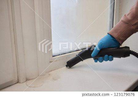 Efficient Steam Cleaning of Windows Utilizing Specialized Professional Equipment and Tools Efficient Steam Cleaning of Windows Utilizing Specialized Professional Equipment and Tools 123179076