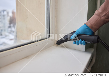Efficient Steam Cleaning of Windows Utilizing Specialized Professional Equipment and Tools 123179091