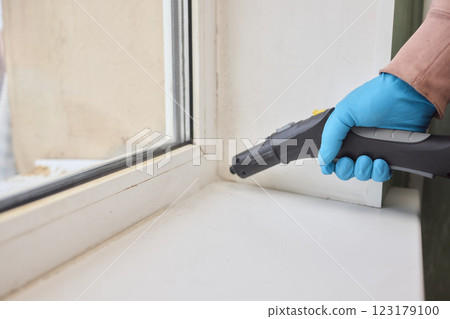 Efficient Steam Cleaning of Windows Utilizing Specialized Professional Equipment and Tools Efficient Steam Cleaning of Windows Utilizing Specialized Professional Equipment and Tools 123179100