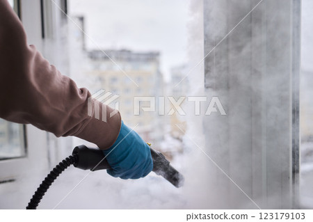 Efficient Steam Cleaning of Windows Utilizing Specialized Professional Equipment and Tools Efficient Steam Cleaning of Windows Utilizing Specialized Professional Equipment and Tools 123179103