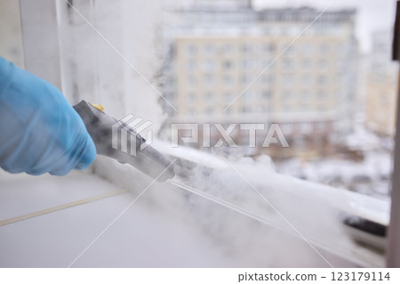 Efficient Steam Cleaning of Windows Utilizing Specialized Professional Equipment and Tools Efficient Steam Cleaning of Windows Utilizing Specialized Professional Equipment and Tools 123179114