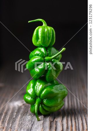 Three ripened green habanero peppers 123179296