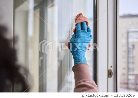 Utilizing a Cloth to Clean the Window for Achieving a Pristine and Sparkling Shine Effect 123180209