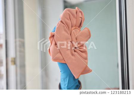 Utilizing a Cloth to Clean the Window for Achieving a Pristine and Sparkling Shine Effect 123180213
