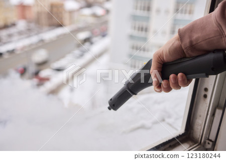 Efficient Steam Cleaning of Windows Utilizing Specialized Professional Equipment and Tools 123180244