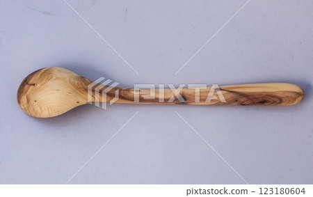 Wooden kitchen utensils stacked view close up Wooden kitchen utensils stacked view close up 123180604