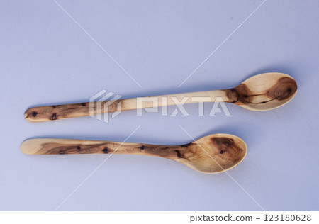 Wooden kitchen utensils stacked view close up Wooden kitchen utensils stacked view close up 123180628