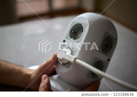 Introducing a modern power strip with multiple outlets for efficient charging and convenience 123180636