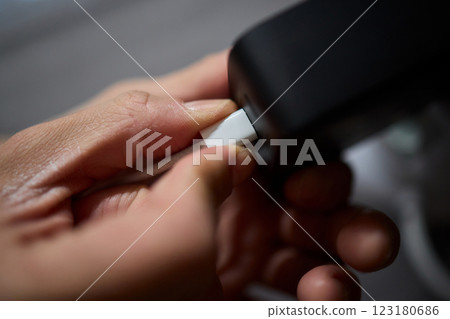 Charging devices that feature multiple ports and connectors for versatile connectivity 123180686