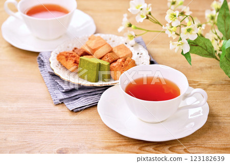 Tea time for two with cookies. 123182639