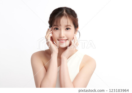 Beautiful young asian woman with clean fresh skin on white background, Face care, Facial treatment, Cosmetology, beauty and spa, Asian women portrait. Beautiful young asian woman with clean fresh skin on white background, Face care, Facial treatment, Cosmetology, beauty and spa, Asian women portrait. 123183964