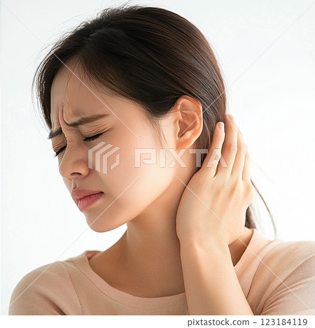 A woman suffering from stiff neck 123184119