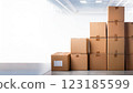 Cardboard boxes piled up in a warehouse 123185599