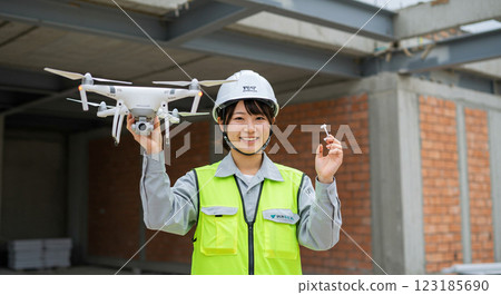 Female worker with a drone 123185690