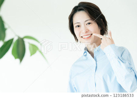 Woman with beautiful teeth Woman with beautiful teeth 123186533