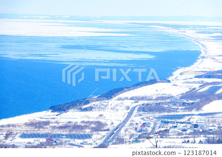 Winter cityscape of Monbetsu, Hokkaido, seen from a hilltop Winter cityscape of Monbetsu, Hokkaido, seen from a hilltop 123187014