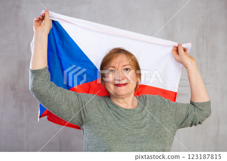 Cheerful senior woman holding flag of Czech Republic 123187815
