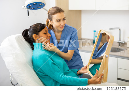 Woman feeling satisfied after cosmetological procedures Woman feeling satisfied after cosmetological procedures 123188575