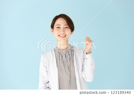 Female business portrait fist pump 123189340
